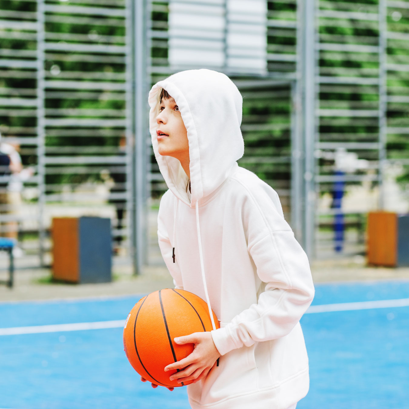 teenage-boy-plays-basketball-on-court-lesson-at-s-2022-06-15-15-13-39-utc